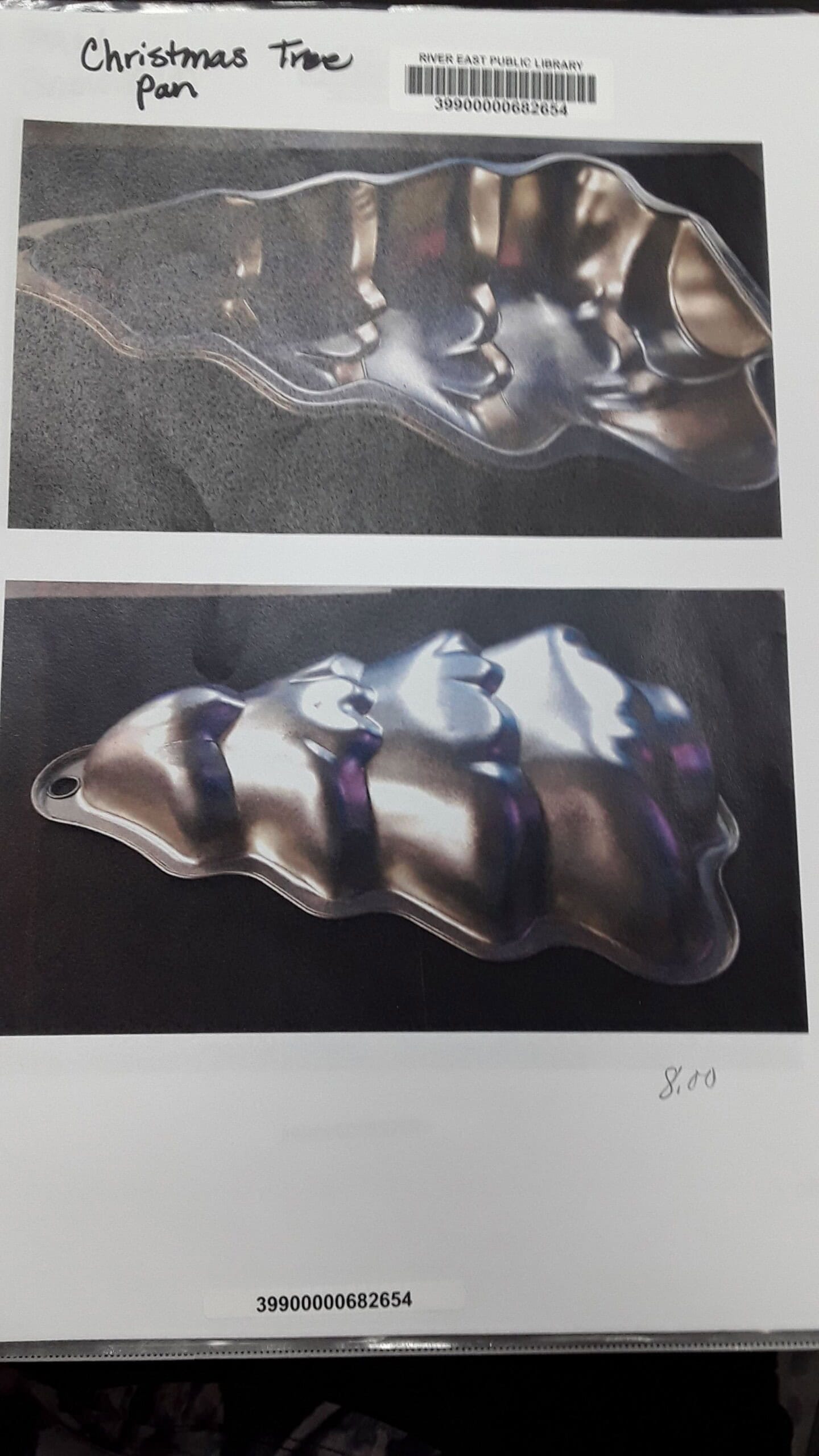 Two photos of a metallic baking pan shaped like a Christmas tree are shown on a printed page. The handwritten label reads Christmas Tree Pan. The price $8.00 is written near the bottom photo.