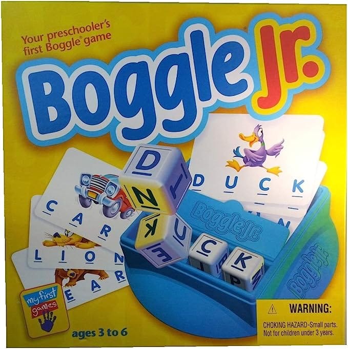 The box for Boggle Jr. shows letter cubes, word cards with animal illustrations, and the game logo. Text indicates it’s for ages 3 to 6. There is a choking hazard warning in the bottom right corner.