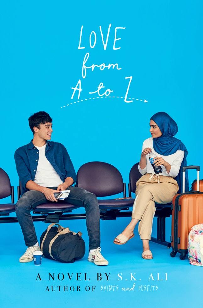 A young man and a young woman in a blue hijab sit in an airport waiting area with luggage, looking at each other. The book title Love from A to Z is above them on a blue background.