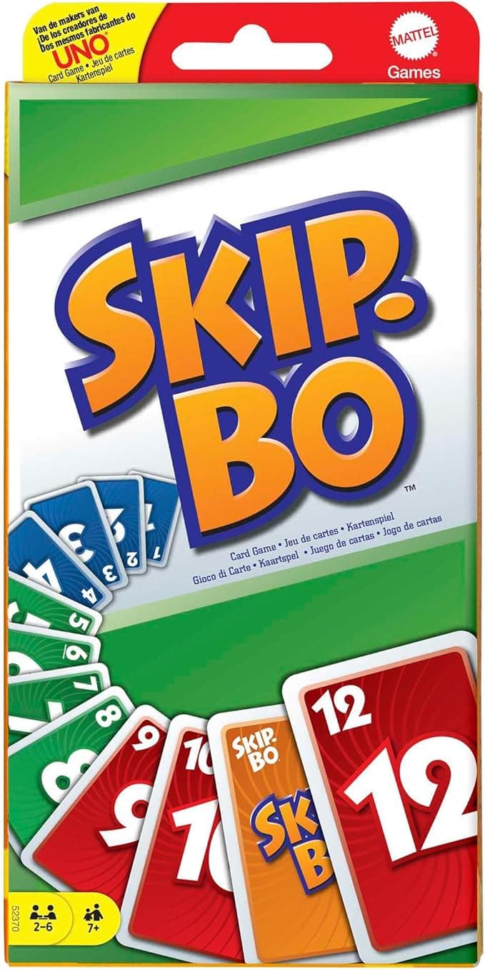 The image shows the front of a Skip-Bo card game box. The box is mostly green and white, with colorful number cards and the Skip-Bo logo prominently displayed in the center. The game is for 2-6 players, ages 7 and up.